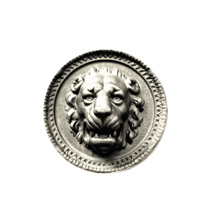 Detailed silver circular medallion featuring a sculpted lion's head with a thick, flowing mane.